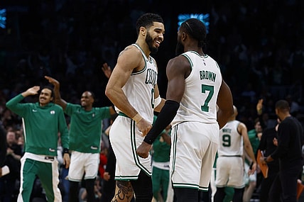Jan 10, 2024; Boston, Massachusetts, USA; Boston Celtics forward Jayson Tatum (0) and guard Jaylen Brown (7) celebrate during overtime of their 127-120 win over the Minnesota Timberwolves  at TD Garden. Mandatory Credit: Winslow Townson-USA TODAY Sports