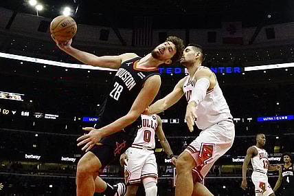 Jan 10, 2024; Chicago, Illinois, USA; Chicago Bulls center Nikola Vucevic (9) fouls Houston Rockets center Alperen Sengun (28) during the second half at United Center. Mandatory Credit: David Banks-USA TODAY Sports