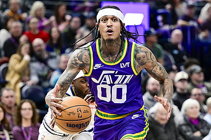 Jan 10, 2024; Salt Lake City, Utah, USA; Denver Nuggets forward/guard Justin Holiday (9) reaches for the ball by Utah Jazz guard Jordan Clarkson (00) during the second half at the Delta Center. Mandatory Credit: Christopher Creveling-USA TODAY Sports