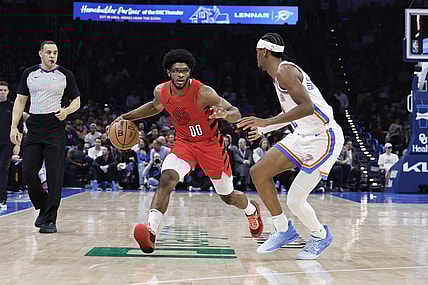 Jan 11, 2024; Oklahoma City, Oklahoma, USA; Portland Trail Blazers guard Scoot Henderson (00) drives down the court against Oklahoma City Thunder guard Shai Gilgeous-Alexander (2) during the second quarter at Paycom Center. Mandatory Credit: Alonzo Adams-USA TODAY Sports