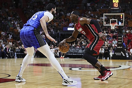 Jan 12, 2024; Miami, Florida, USA; Miami Heat center Bam Adebayo (13) dribbles the basketball as Orlando Magic center Goga Bitadze (35) defends during the first quarter at Kaseya Center. Mandatory Credit: Sam Navarro-USA TODAY Sports