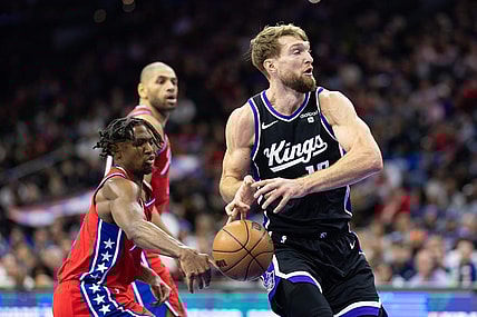 Jan 12, 2024; Philadelphia, Pennsylvania, USA; Philadelphia 76ers guard Tyrese Maxey (0) knocks the ball away from Sacramento Kings forward Domantas Sabonis (10) during the second quarter at Wells Fargo Center. Mandatory Credit: Bill Streicher-USA TODAY Sports
