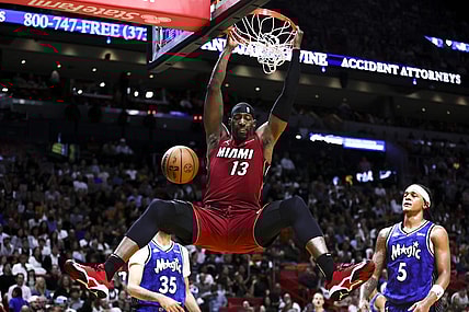 Jan 12, 2024; Miami, Florida, USA; Miami Heat center Bam Adebayo (13) dunks the basketball against the Orlando Magic during the second quarter at Kaseya Center. Mandatory Credit: Sam Navarro-USA TODAY Sports