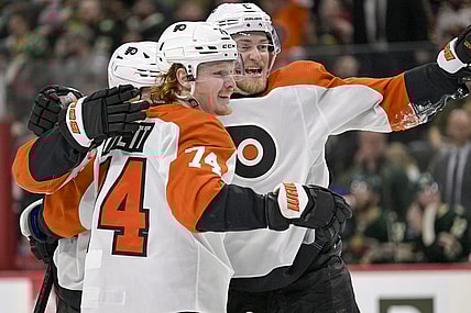 Jan 12, 2024; Saint Paul, Minnesota, USA; Philadelphia Flyers forward Owen Tippett (74) celebrates his goal against the Minnesota Wild during the third period with defenseman Travis Sanheim (6) at Xcel Energy Center. Mandatory Credit: Nick Wosika-USA TODAY Sports