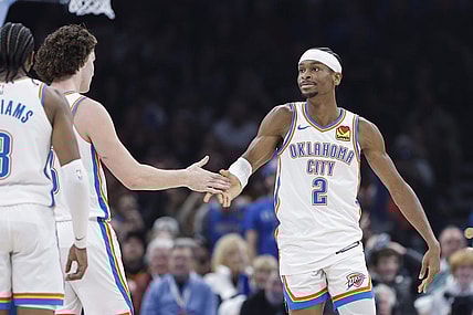 Jan 13, 2024; Oklahoma City, Oklahoma, USA; Oklahoma City Thunder guard Shai Gilgeous-Alexander (2) celebrates with guard Josh Giddey (3) after scoring against the Orlando Magic during the second quarter at Paycom Center. Mandatory Credit: Alonzo Adams-USA TODAY Sports