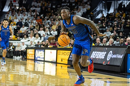 Jan 14, 2024; Wichita, Kansas, USA; Memphis Tigers guard Jaykwon Walton (10) brings the ball up court during the second half against the Wichita State Shockers at Charles Koch Arena. Mandatory Credit: William Purnell-USA TODAY Sports