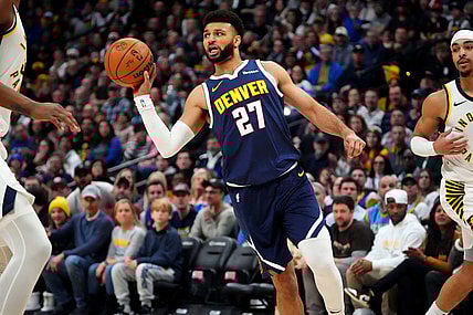 Jan 14, 2024; Denver, Colorado, USA; Denver Nuggets guard Jamal Murray (27) passes the ball in the first quarter against the Indiana Pacers at Ball Arena. Mandatory Credit: Ron Chenoy-USA TODAY Sports