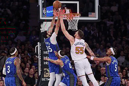 Jan 15, 2024; New York, New York, USA; Orlando Magic center Goga Bitadze (35) rebounds against New York Knicks center Isaiah Hartenstein (55) during the first half at Madison Square Garden. Mandatory Credit: Vincent Carchietta-USA TODAY Sports