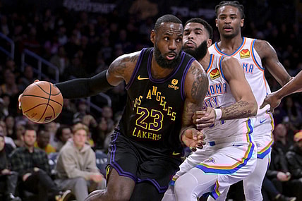 Jan 15, 2024; Los Angeles, California, USA;   Los Angeles Lakers forward LeBron James (23) drives past Oklahoma City Thunder guard Cason Wallace (22) in the first half at Crypto.com Arena. Mandatory Credit: Jayne Kamin-Oncea-USA TODAY Sports