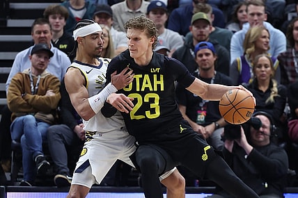 Jan 15, 2024; Salt Lake City, Utah, USA; Utah Jazz forward Lauri Markkanen (23) dribbles against Indiana Pacers guard Andrew Nembhard (2) during the first quarter at Delta Center. Mandatory Credit: Rob Gray-USA TODAY Sports