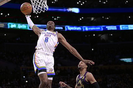 Jan 15, 2024; Los Angeles, California, USA; Oklahoma City Thunder forward Jalen Williams (8) scores past Los Angeles Lakers forward Christian Wood (35) in the second half against at Crypto.com Arena. Mandatory Credit: Jayne Kamin-Oncea-USA TODAY Sports