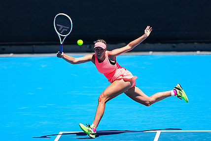 Jan 16, 2024; Melbourne, Victoria, Australia; Danielle Collins of the United States plays a shot against Angelique Kerber (not pictured) of Germany in Round 1 of the Women's Singles on Day 3 of the Australian Open tennis at Rod Laver Arena. Mandatory Credit: Mike Frey-USA TODAY Sports