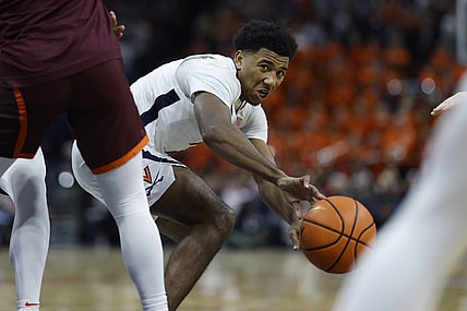 Jan 17, 2024; Charlottesville, Virginia, USA; Virginia Cavaliers guard Reece Beekman (2) passes the ball against the Virginia Tech Hokies in the second half at John Paul Jones Arena. Mandatory Credit: Geoff Burke-USA TODAY Sports