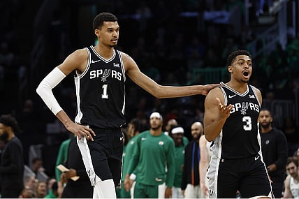 Jan 17, 2024; Boston, Massachusetts, USA; San Antonio Spurs center Victor Wembanyama (1) and forward Keldon Johnson (3) head for the bench during the second half of their game against the Boston Celtics at TD Garden. Mandatory Credit: Winslow Townson-USA TODAY Sports