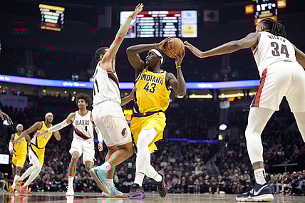 Jan 19, 2024; Portland, Oregon, USA; Indiana Pacers power forward Pascal Siakam (43) looks to pass while defended by Portland Trail Blazers point guard Malcolm Brogdon (11) during the first half at Moda Center. Mandatory Credit: Soobum Im-USA TODAY Sports