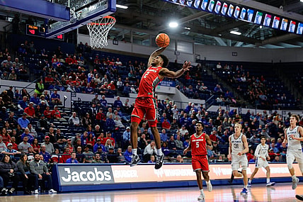 Jan 20, 2024; Colorado Springs, Colorado, USA; New Mexico Lobos guard Donovan Dent (2) dunks the ball in the second half against the Air Force Falcons at Clune Arena. Mandatory Credit: Isaiah J. Downing-USA TODAY Sports