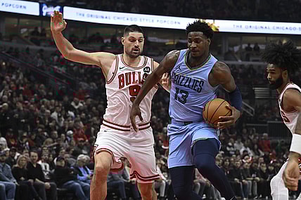 Jan 20, 2024; Chicago, Illinois, USA;  Chicago Bulls center Nikola Vucevic (9) defends against Memphis Grizzlies forward Jaren Jackson Jr. (13) during the first half at the United Center. Mandatory Credit: Matt Marton-USA TODAY Sports