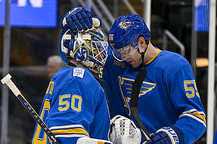 Jan 20, 2024; St. Louis, Missouri, USA;  St. Louis Blues goaltender Jordan Binnington (50) and defenseman Colton Parayko (55) celebrate after the Blues defeated the Washington Capitals at Enterprise Center. Mandatory Credit: Jeff Curry-USA TODAY Sports