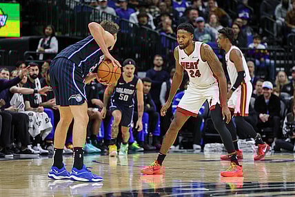 Jan 21, 2024; Orlando, Florida, USA; Miami Heat forward Haywood Highsmith (24) defends Orlando Magic forward Franz Wagner (22) during the second quarter at Amway Center. Mandatory Credit: Mike Watters-USA TODAY Sports