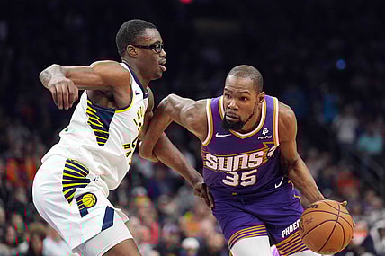 Jan 21, 2024; Phoenix, Arizona, USA; Phoenix Suns forward Kevin Durant (35) dribbles against Indiana Pacers forward Jalen Smith (25) during the first half at Footprint Center. Mandatory Credit: Joe Camporeale-USA TODAY Sports
