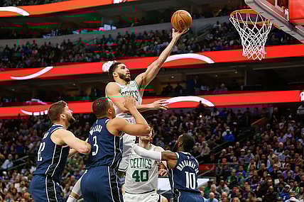 Jan 22, 2024; Dallas, Texas, USA; Boston Celtics forward Jayson Tatum (0) shoots during the first quarter against the Dallas Mavericks at American Airlines Center. Mandatory Credit: Andrew Dieb-USA TODAY Sports