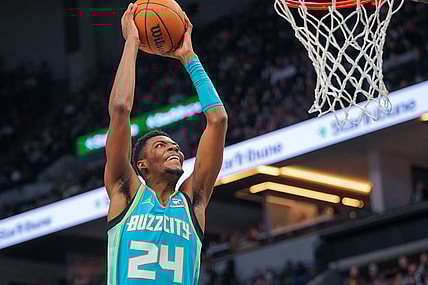 Jan 22, 2024; Minneapolis, Minnesota, USA; Charlotte Hornets forward Brandon Miller (24) dunks against the Minnesota Timberwolves in the third quarter at Target Center. Mandatory Credit: Brad Rempel-USA TODAY Sports