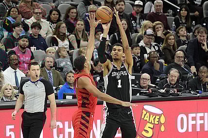 Jan 26, 2024; San Antonio, Texas, USA; San Antonio Spurs forward Victor Wembanyama (1) shoots over Portland Trail Blazers forward Kris Murray (8) during the first half at Frost Bank Center. Mandatory Credit: Scott Wachter-USA TODAY Sports