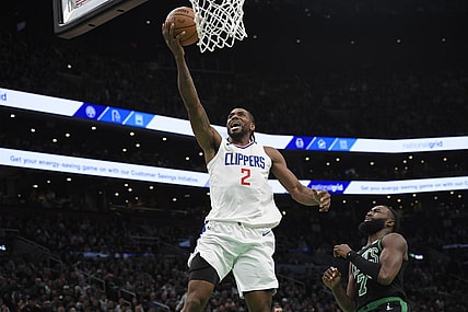 Jan 27, 2024; Boston, Massachusetts, USA;  LA Clippers forward Kawhi Leonard (2) lays the ball in the basket during the first half against the Boston Celtics at TD Garden. Mandatory Credit: Bob DeChiara-USA TODAY Sports