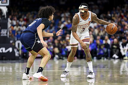 Jan 28, 2024; Orlando, Florida, USA;  Phoenix Suns guard Bradley Beal (3) controls the ball from Orlando Magic guard Anthony Black (0) in the second quarter at the Kia Center. Mandatory Credit: Nathan Ray Seebeck-USA TODAY Sports