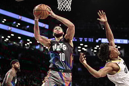Jan 29, 2024; Brooklyn, New York, USA;  Brooklyn Nets guard Ben Simmons (10) grabs a rebound past Utah Jazz guard Collin Sexton (2) in the second quarter against the Utah Jazz at Barclays Center. Mandatory Credit: Wendell Cruz-USA TODAY Sports