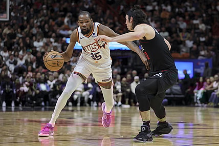 Jan 29, 2024; Miami, Florida, USA; Phoenix Suns forward Kevin Durant (35) moves to the basket against Miami Heat guard Jaime Jaquez Jr. (11) during the second quarter at Kaseya Center. Mandatory Credit: Sam Navarro-USA TODAY Sports