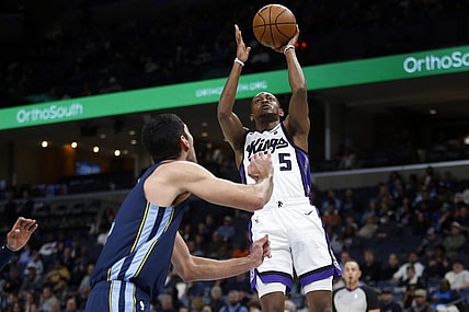 Jan 29, 2024; Memphis, Tennessee, USA; Sacramento Kings guard De'Aaron Fox (5) shoots during the first half against the Memphis Grizzlies at FedExForum. Mandatory Credit: Petre Thomas-USA TODAY Sports