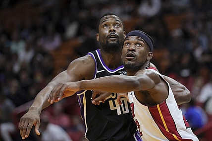 Jan 31, 2024; Miami, Florida, USA; Miami Heat forward Jimmy Butler (22) guards Sacramento Kings forward Harrison Barnes (40) during a free throw attempts in the first quarter at Kaseya Center. Mandatory Credit: Sam Navarro-USA TODAY Sports