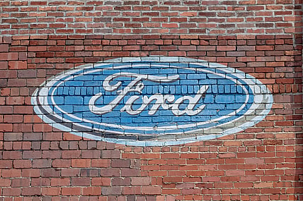 The Ford logo is still emblazoned on the side of 1023 Wheeling Avenue. Once the location of Ken Bender motors, the building now houses Dutch Concepts Furniture store.

Historic 900 1000 Block 8