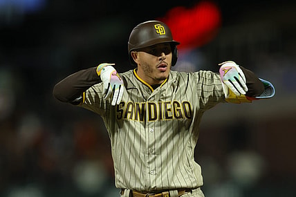 Sep 25, 2023; San Francisco, California, USA;  San Diego Padres third baseman Manny Machado (13) celebrates after a single during the ninth inning against the San Francisco Giants at Oracle Park. Mandatory Credit: Sergio Estrada-USA TODAY Sports