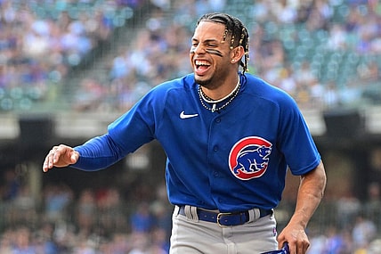 Oct 1, 2023; Milwaukee, Wisconsin, USA; Chicago Cubs shortstop Christopher Morel (5) jokes with teammates between innings against the Milwaukee Brewers at American Family Field. Mandatory Credit: Benny Sieu-USA TODAY Sports
