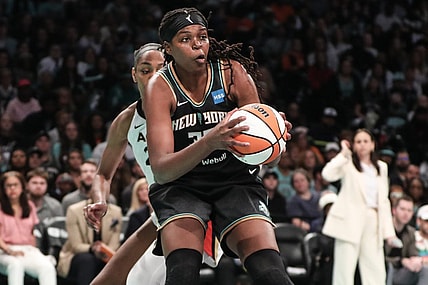 Oct 15, 2023; Brooklyn, New York, USA; New York Liberty forward Jonquel Jones (35) grabs a rebound against the Las Vegas Aces in the second quarter during game three of the 2023 WNBA Finals at Barclays Center. Mandatory Credit: Wendell Cruz-USA TODAY Sports