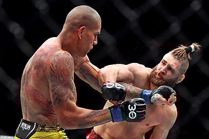 Nov 11, 2023; New York, NY, USA; Jiri Prochazka (red gloves) fights Alex Pereira (blue gloves) during UFC 295 at Madison Square Garden. Mandatory Credit: Wendell Cruz-USA TODAY Sports