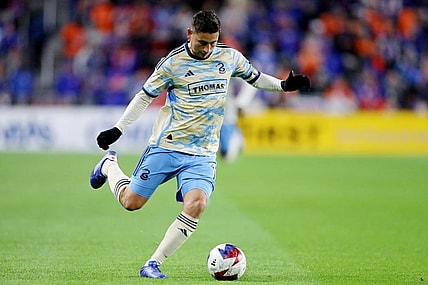 Nov 25, 2023; Cincinnati, Ohio, USA; Philadelphia Union midfielder Alejandro Bedoya (11) kicks the ball against FC Cincinnati during the first half in a MLS Cup Eastern Conference Semifinal match at TQL Stadium. Mandatory Credit: Joseph Maiorana-USA TODAY Sports