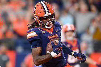 Nov 25, 2023; Syracuse, New York, USA; Syracuse Orange wide receiver Damien Alford (5) runs into the end zone for a touchdown against the Wake Forest Demon Deacons during the second half at the JMA Wireless Dome. Mandatory Credit: Rich Barnes-USA TODAY Sports