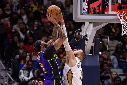 Dec 31, 2023; New Orleans, Louisiana, USA;  New Orleans Pelicans center Jonas Valanciunas (17) blocks the jump shot attempt by Los Angeles Lakers forward Anthony Davis (3) during the second half at Smoothie King Center. Mandatory Credit: Stephen Lew-USA TODAY Sports