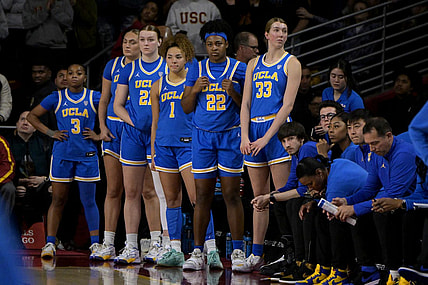 Jan 14, 2024; Los Angeles, California, USA; UCLA Bruins guard Londynn Jones (3), forward Angela Dugalic (32), forward Lina Sontag (21), guard Kiki Rice (1), forward Christeen Iwuala (22) and forward Amanda Muse (33) look on from the bench in the final seconds of the game at Galen Center. Mandatory Credit: Jayne Kamin-Oncea-USA TODAY Sports