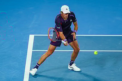Jan 17, 2024; Melbourne, Victoria, Australia; Matteo Arnaldi of Italy plays a shot against Alex de Minaur (not pictured) of Australia in Round 2 of the Men's Singles on Day 4 of the Australian Open tennis at Rod Laver Arena. Mandatory Credit: Mike Frey-USA TODAY Sports