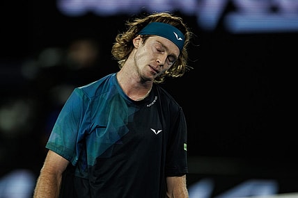 Jan 23, 2024; Melbourne, Victoria, Australia;  Andrey Rublev of Russia reacts during his match against Jannik Sinner of Italy in the quarter final of the men s singles. Mandatory Credit: Mike Frey-USA TODAY Sports