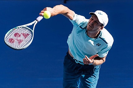 Jan 24, 2024; Melbourne, Victoria, Australia;  Hubert Hurkacz of Poland in action against Daniil Medvedev of Russia in the quarter final of the men   s singles at the Australian Open.Mandatory Credit: Mike Frey-USA TODAY Sports
