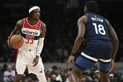 Jan 24, 2024; Washington, District of Columbia, USA; Washington Wizards guard Delon Wright (55) looks to pass as Minnesota Timberwolves guard Shake Milton (18) defends  during the second half at Capital One Arena. Mandatory Credit: Tommy Gilligan-USA TODAY Sports