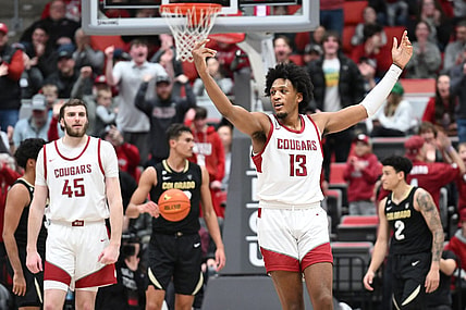 Jan 27, 2024; Pullman, Washington, USA; Washington State Cougars forward Isaac Jones (13) celebrates after a play against the Colorado Buffaloes in the second half at Friel Court at Beasley Coliseum. Washington State won 78-69. Mandatory Credit: James Snook-USA TODAY Sports