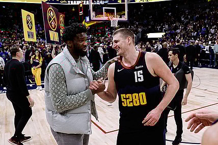 Jan 27, 2024; Denver, Colorado, USA; Philadelphia 76ers center Joel Embiid (21) and Denver Nuggets center Nikola Jokic (15) after the game at Ball Arena. Mandatory Credit: Isaiah J. Downing-USA TODAY Sports