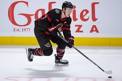 Jan 29, 2024; Ottawa, Ontario, CAN; Ottawa Senators left wing Brady Tkachuk (7) skates with the puck in overtime against the Nashville Predators at the Canadian Tire Centre. Mandatory Credit: Marc DesRosiers-USA TODAY Sports