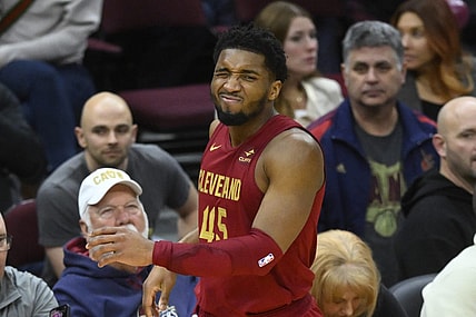 Jan 31, 2024; Cleveland, Ohio, USA; Cleveland Cavaliers guard Donovan Mitchell (45) reacts after he was hit in the face in the fourth quarter against the Detroit Pistons at Rocket Mortgage FieldHouse. Mandatory Credit: David Richard-USA TODAY Sports